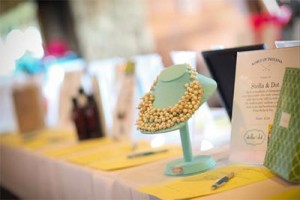 Noble Golf Classic auction table with a necklace on display.